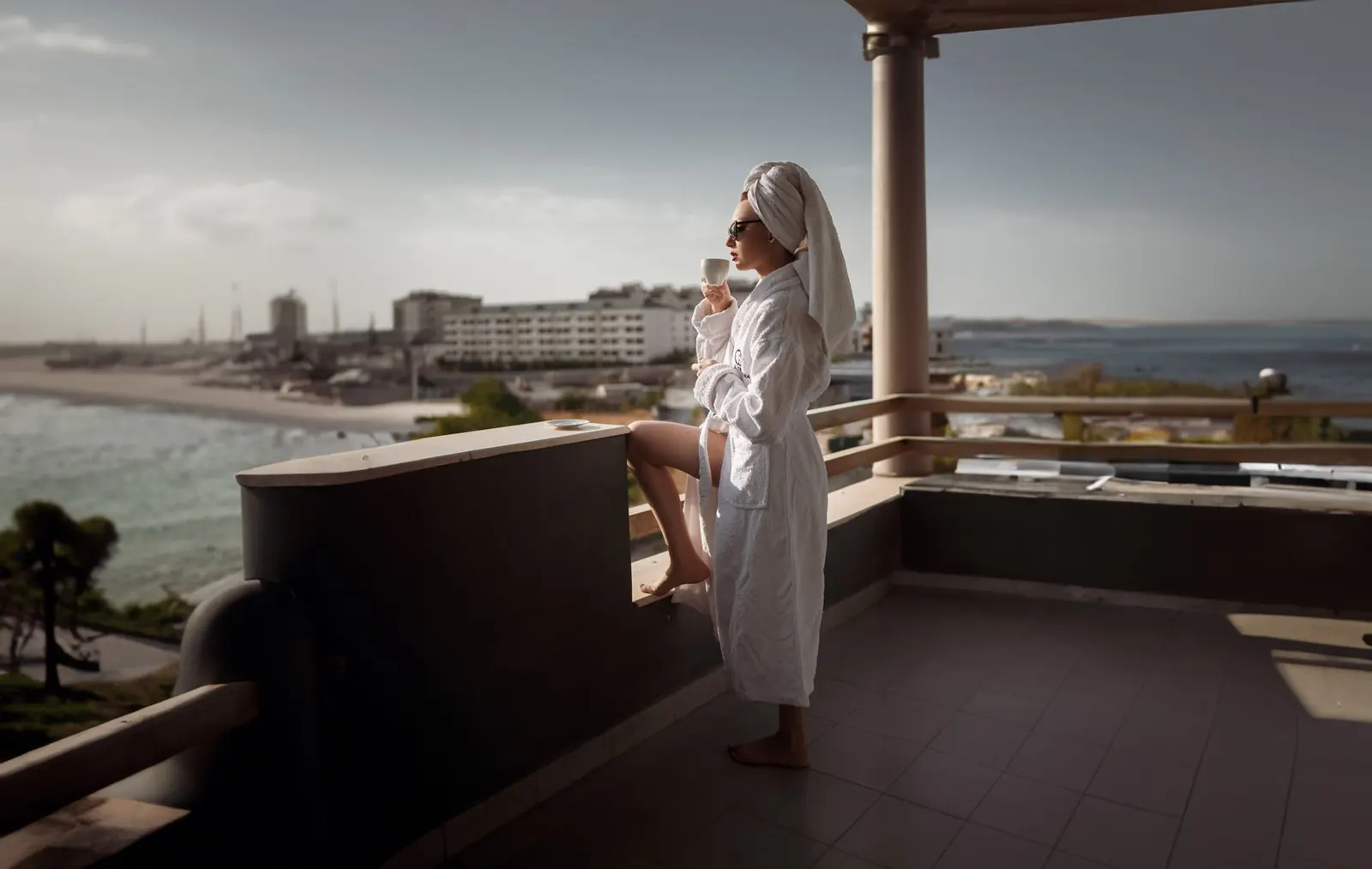 Model on a European city balcony