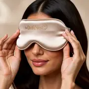 Model wearing the Champagne Silk Sleep Mask